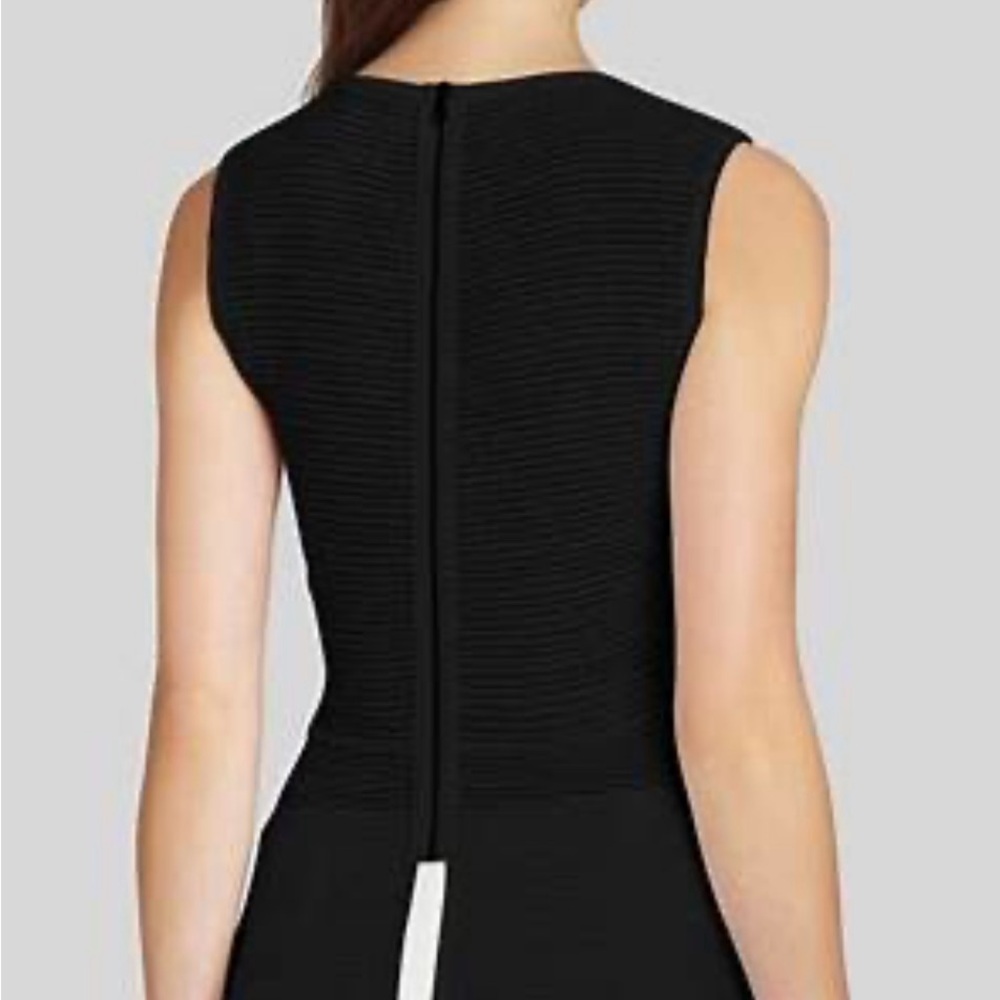 BCBGMaxAzria Black Tank Top with Asymmetrical Peplum and Split Back Design